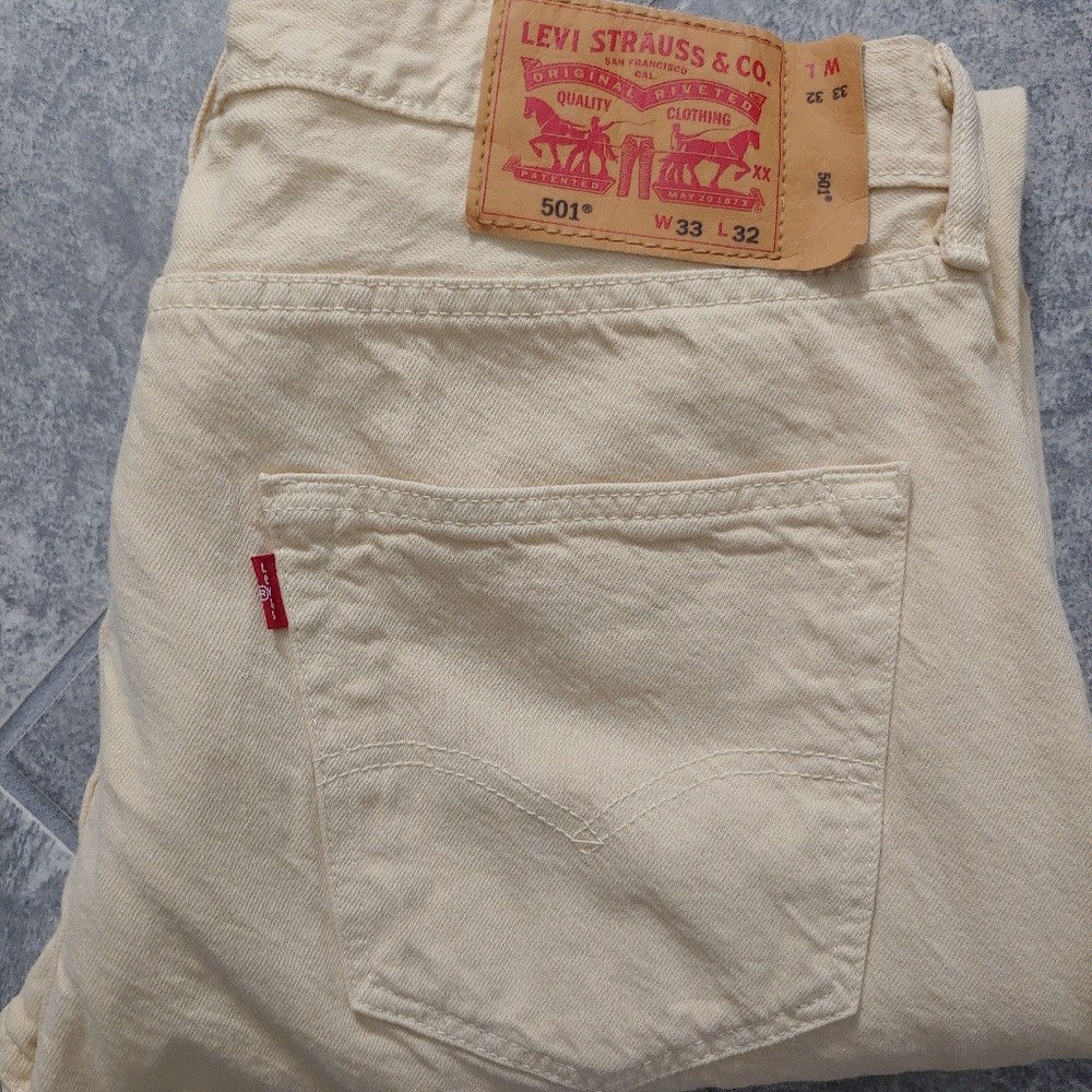 Levi's jeans 33/32 beige cream boot cut pants
